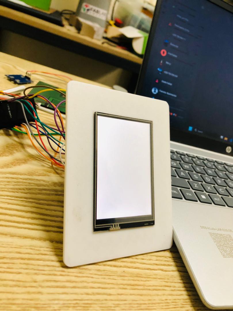 After printing, I started fitting the screen and the solar panel into the enclosure to make sure that all the printed parts were