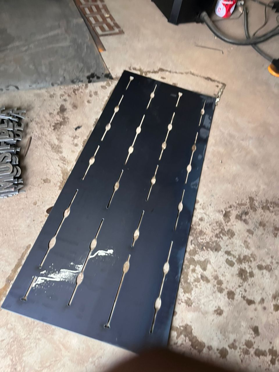 After the cutting process was finished, I removed the artwork from the metal sheet and inspected it to ensure that all parts had