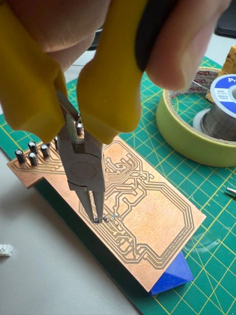 Soldering components close up