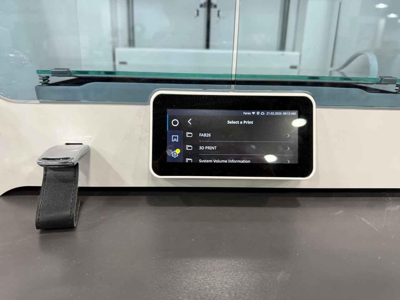 Using the UltiMaker S5 physical touchscreen interface to select the print job from the local FAB26 or 3D PRINT folders.