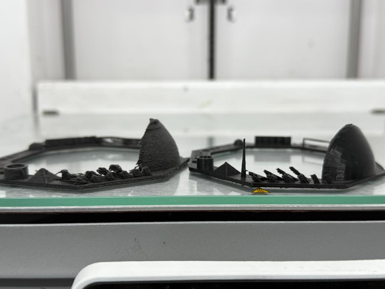 Front elevation view of rough versus clean generic filament prints side-by-side