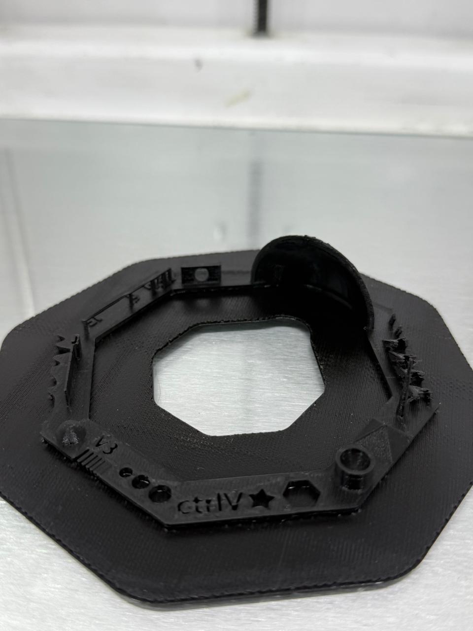 Completed generic PLA test model resting on build template