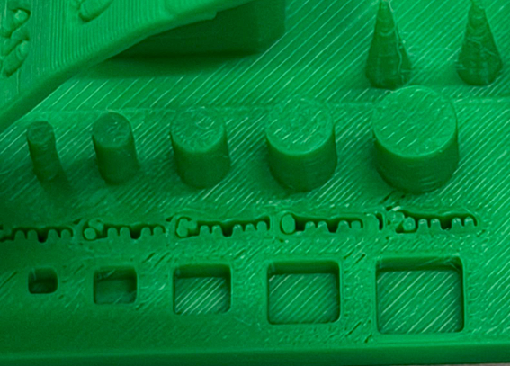 Torture test close-up cylinders and text