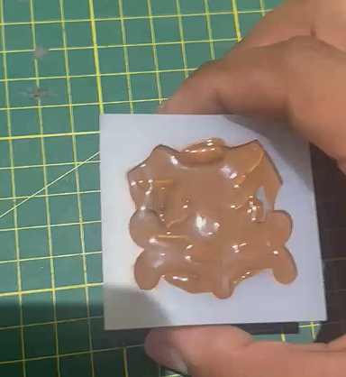 Pouring chocolate into the mold