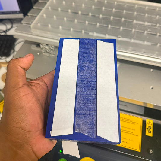 Double-sided tape on wax block
