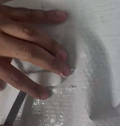 Hand pressing silicone onto paper/cloth flexible layer