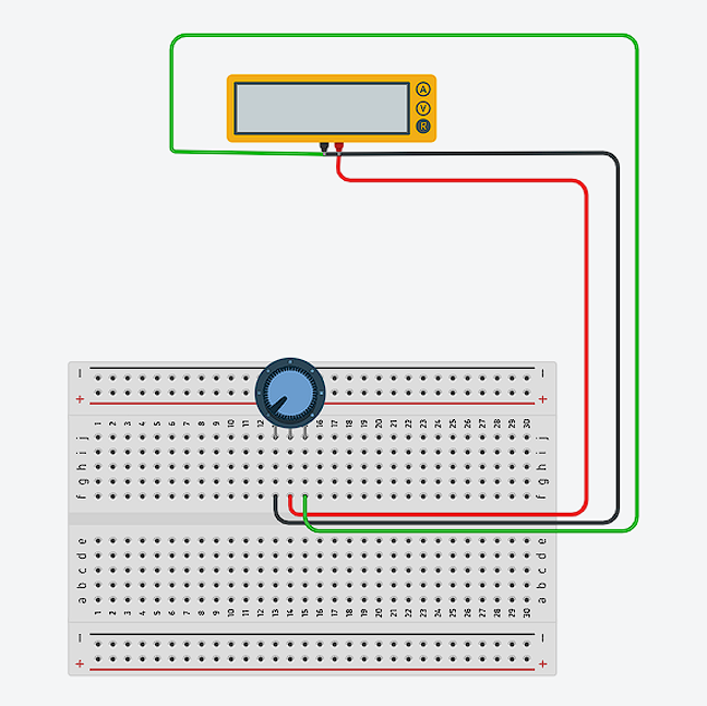 Potentiometer setup on breadboard with multimeter