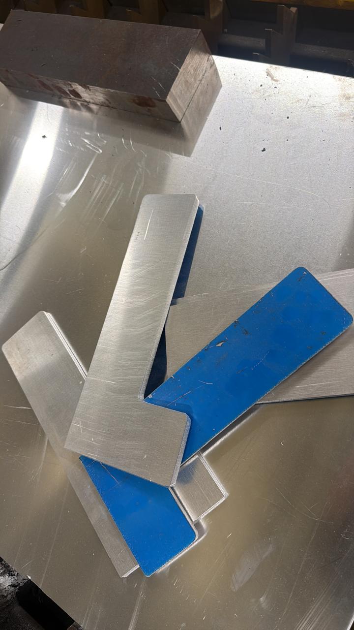 Checking and preparing cut metal parts