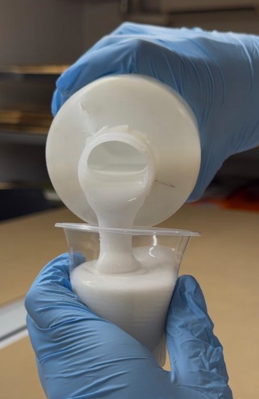 Weighing silicone base on precision scale