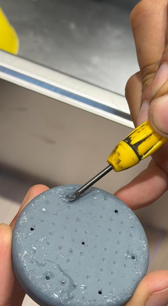Filling pits with residual resin