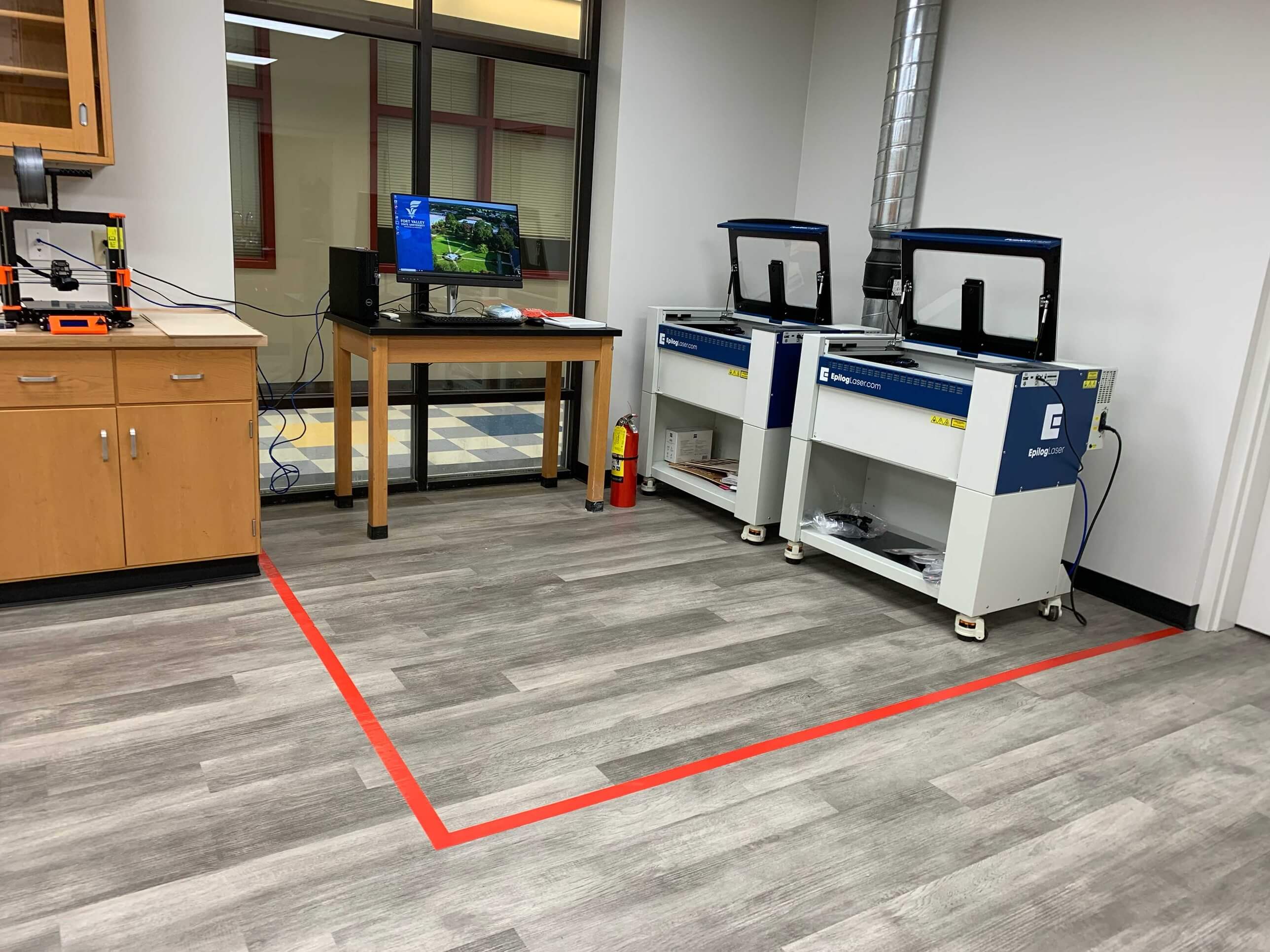 Image of the laser cutter from the entryway of the lab