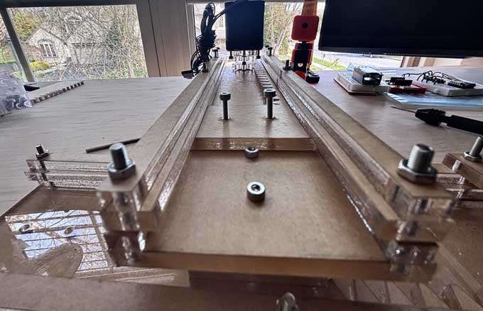 Much of this has to do with the hardware on hand. I only have available button head screws and laser cutters can't reall