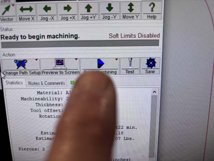The begin machining button in OMAX Make