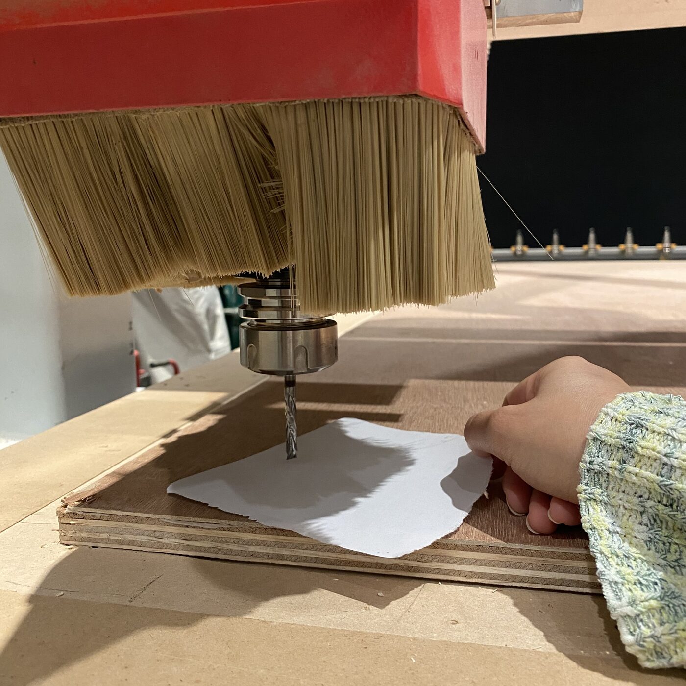 Setting the Z-axis origin so the bit just touches the top surface of the plywood