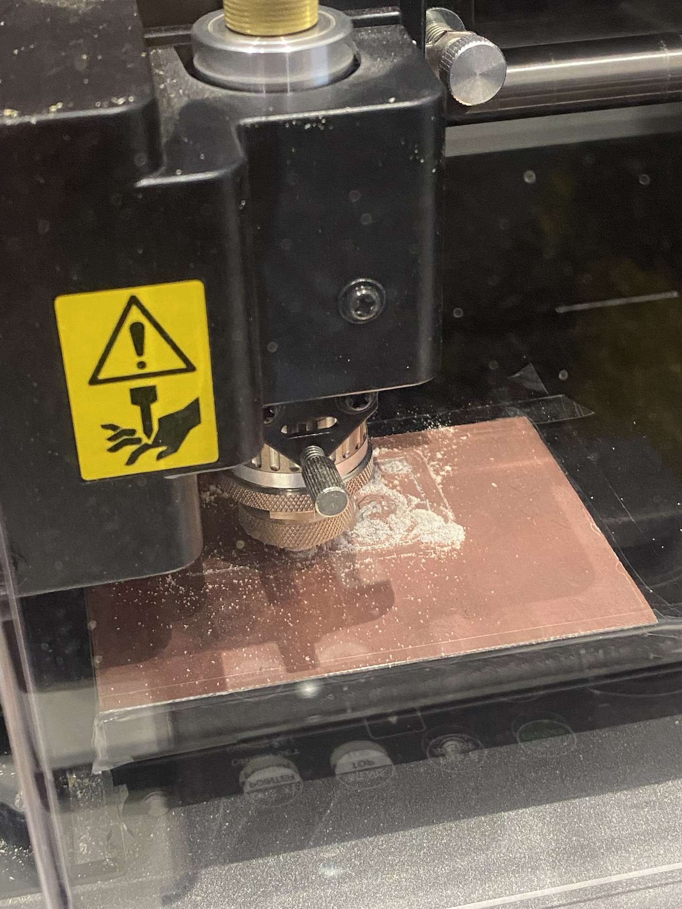 PCB being milled on the Roland iModela