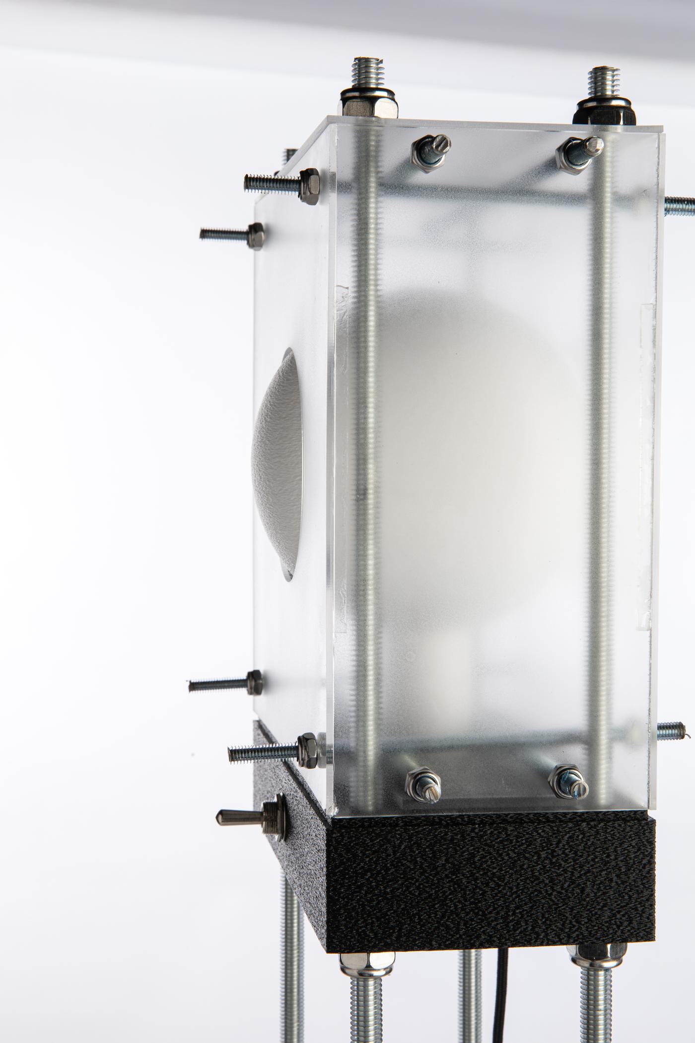 Laser-cut acrylic box and rod-and-nut structural system