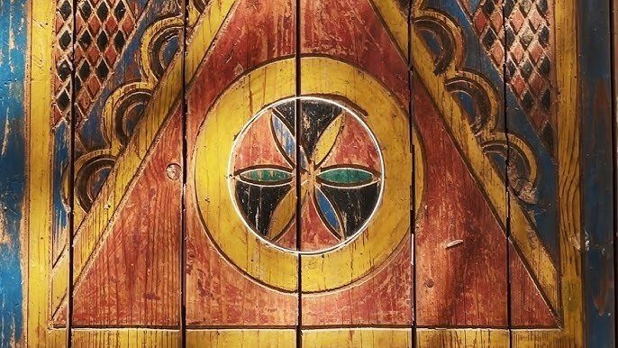 Traditional wooden door panel painted with the Najdi Flower motif