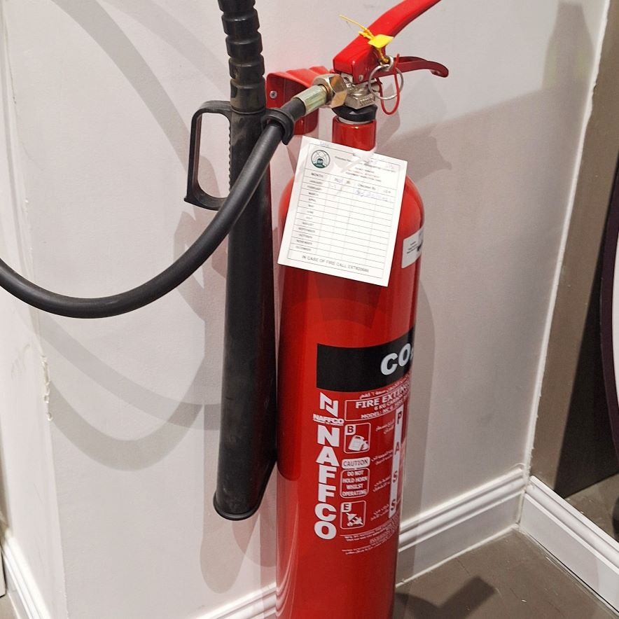 Fire extinguisher near the laser cutter