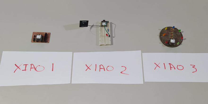 Three custom PCB boards with XIAO modules