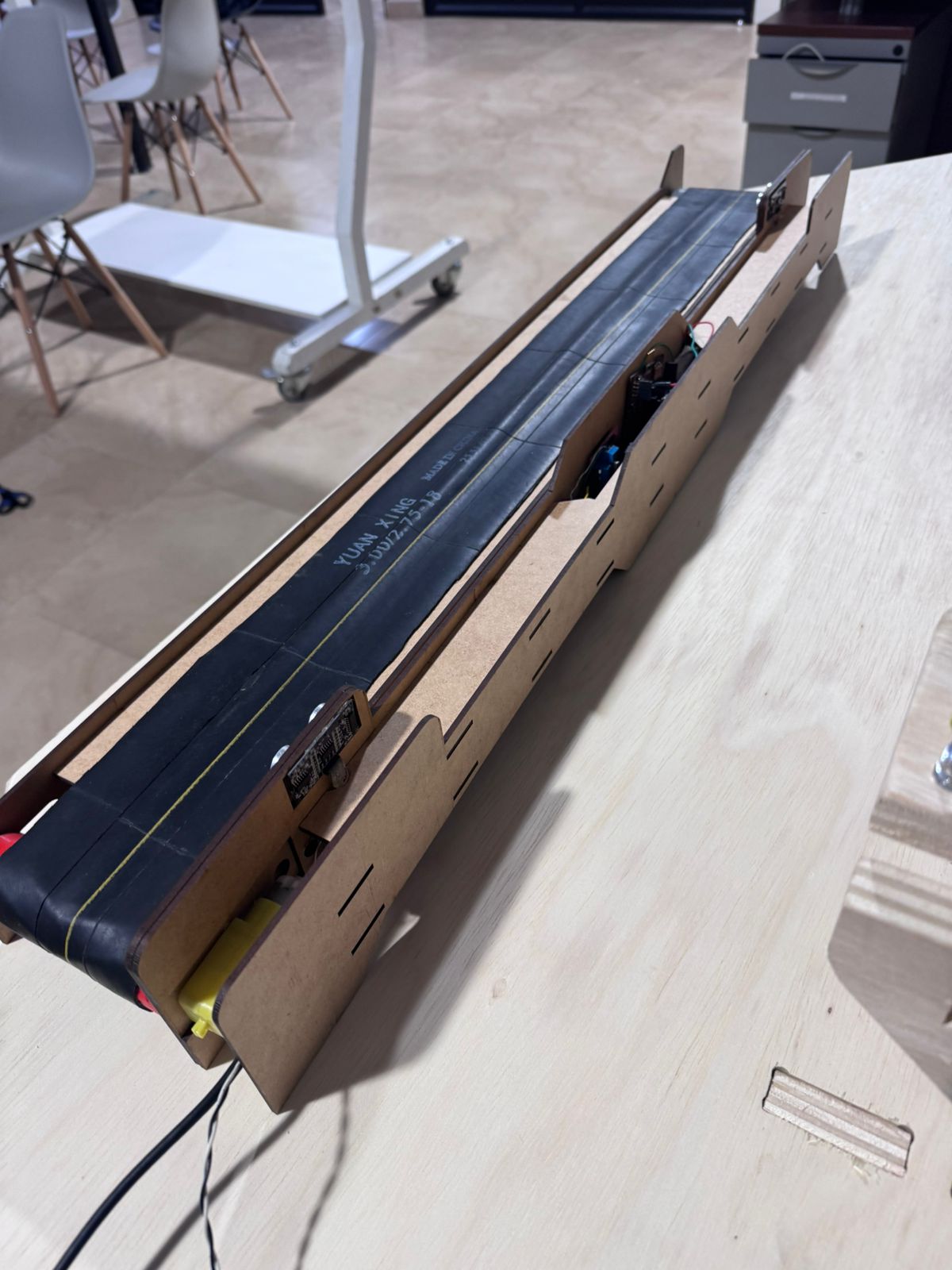 Hero image of the automated conveyor belt machine