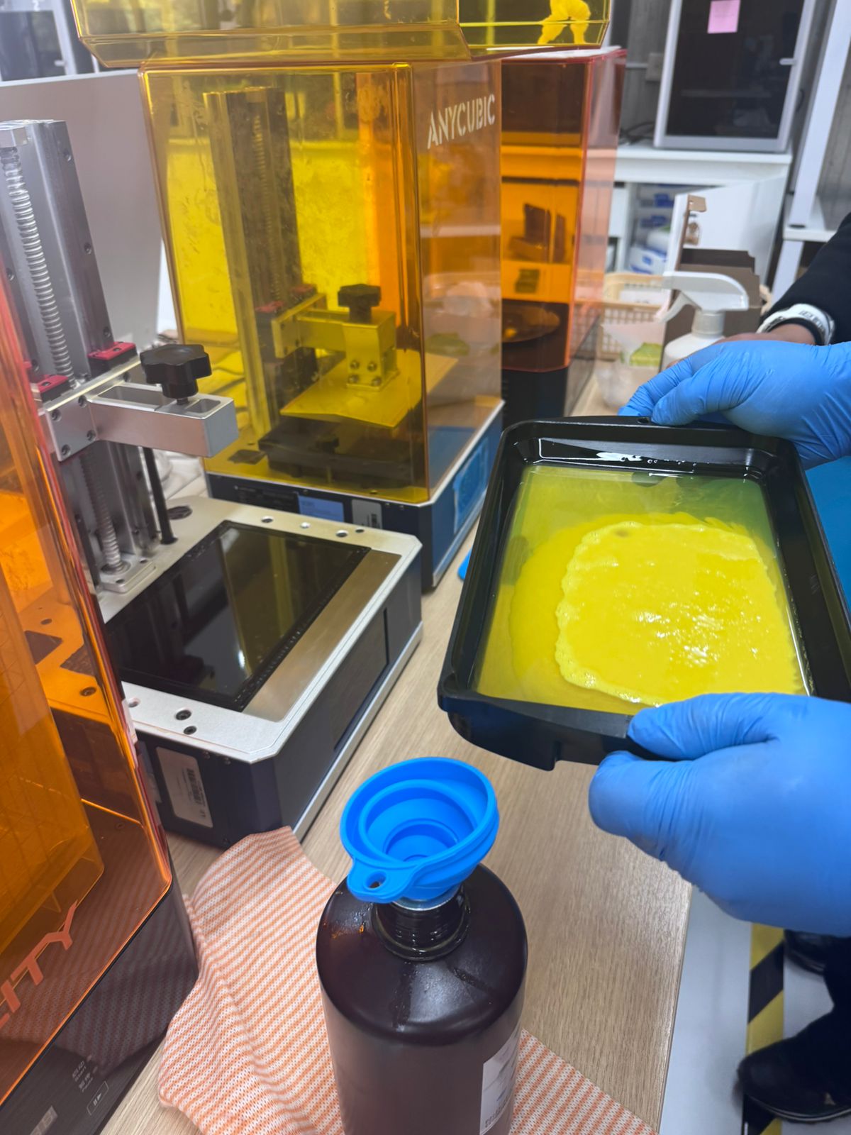 Resin tray and flexible printed mold during handling