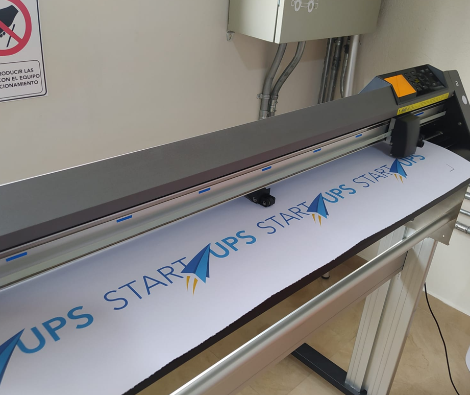 Vinyl being cut on the Graphtec plotter