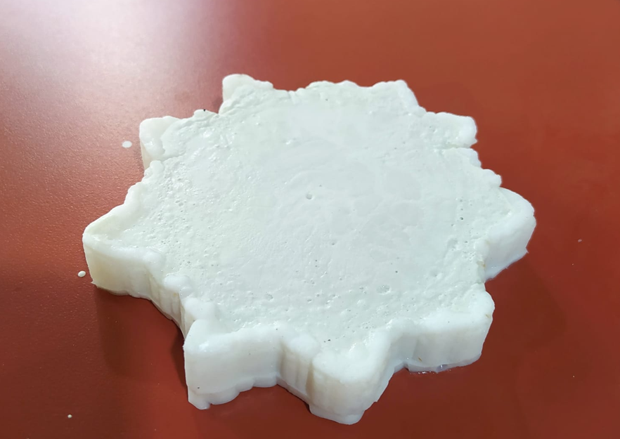 Plaster mixture poured into the silicone mold