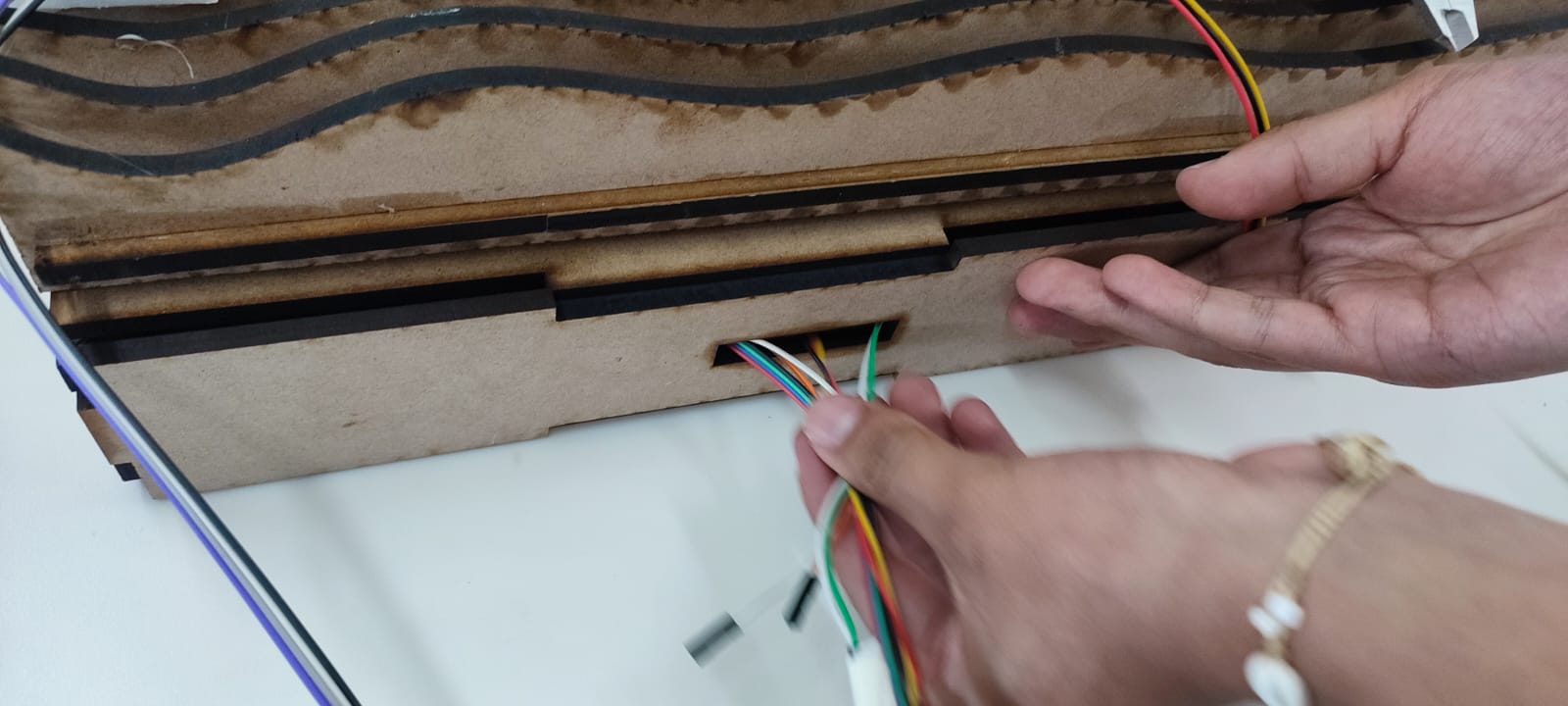 Cable routing through the laser cut frame