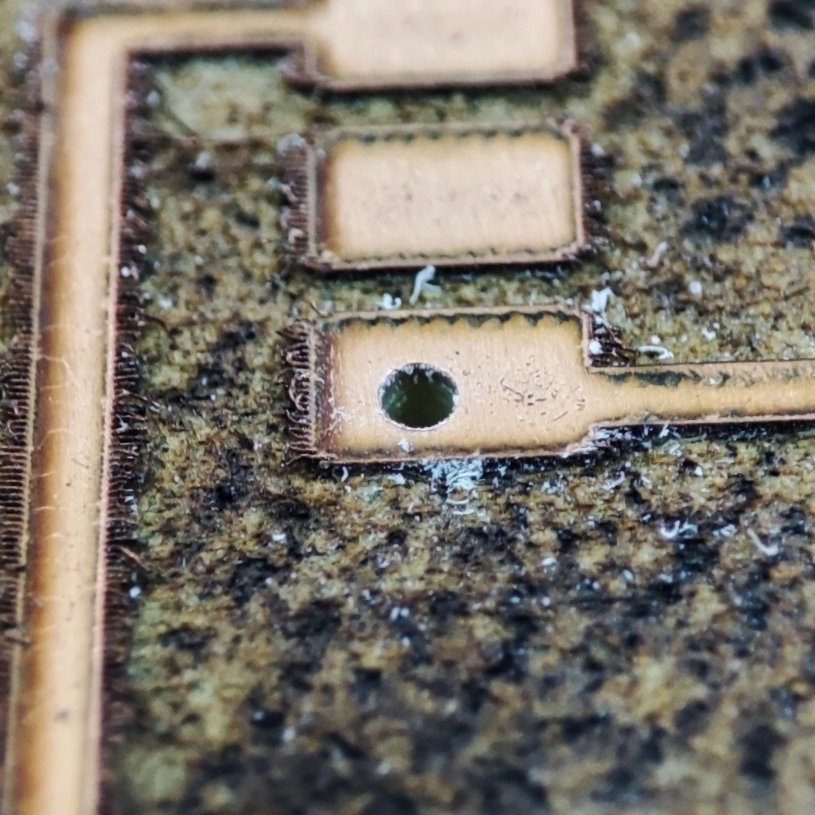 Drilled PCB after laser fabrication