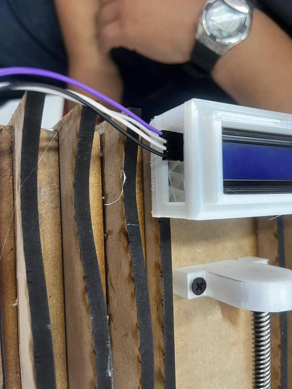 LCD mounted next to the sliced MDF framework