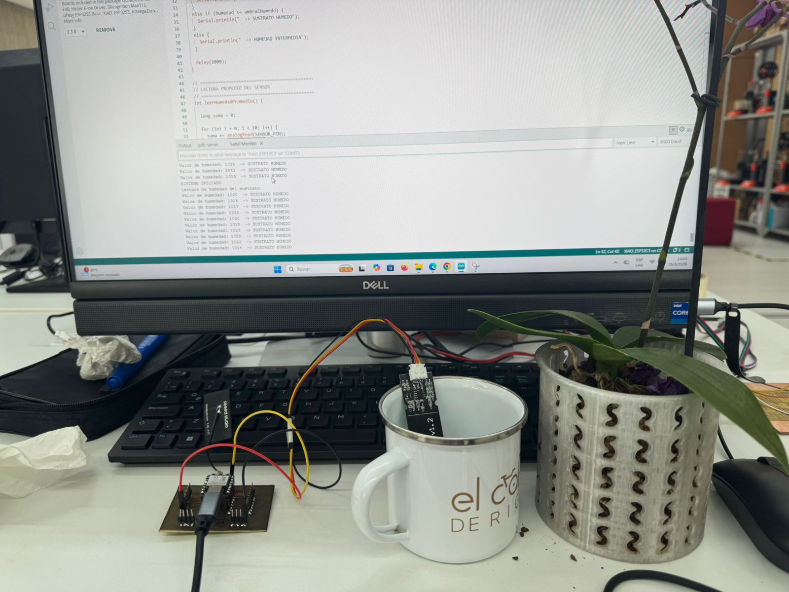 Humidity sensor inserted in water and connected to the custom XIAO PCB