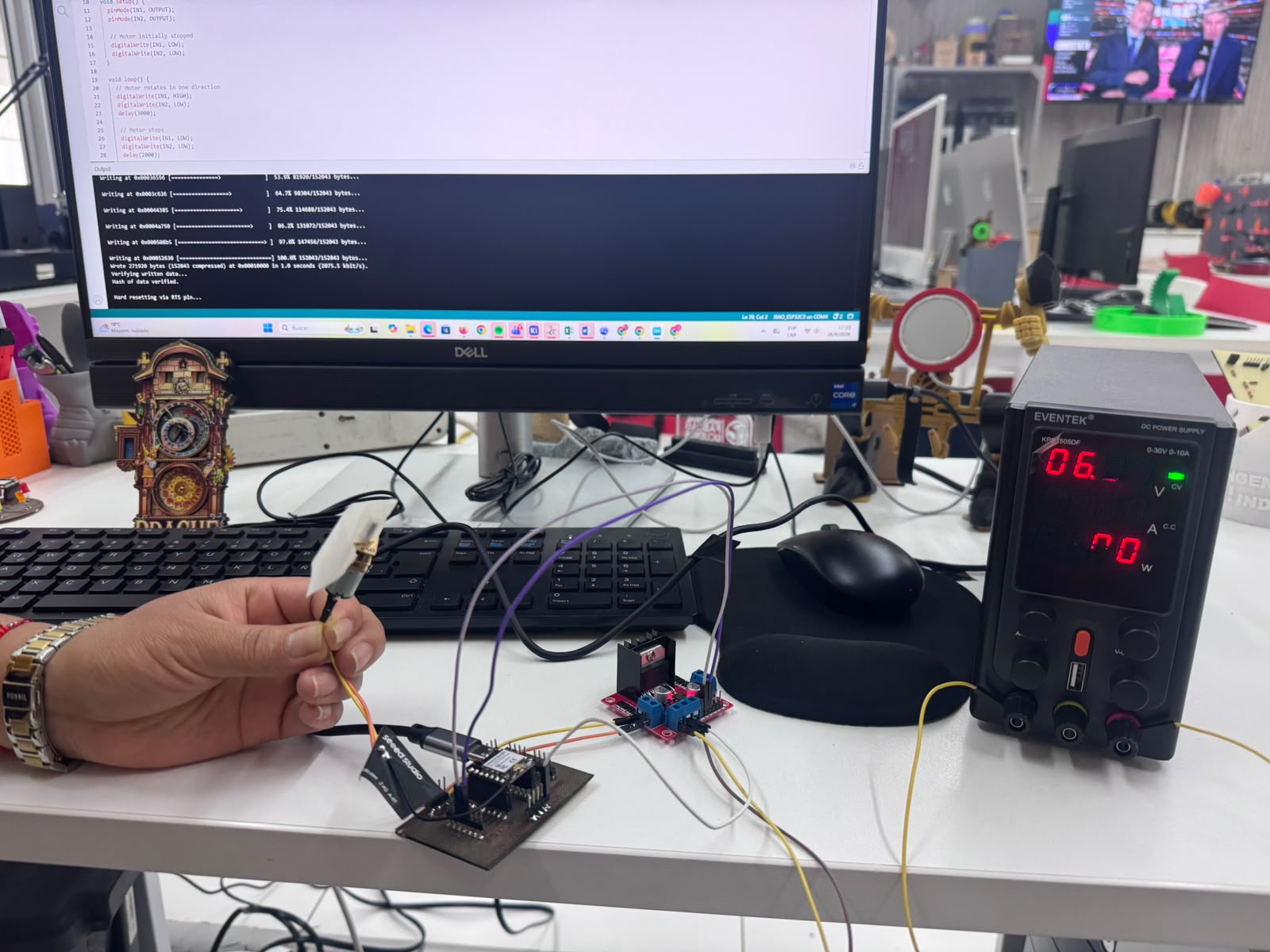 Final assembly of the output device system with PCB, motor driver, motor, and laboratory power supply