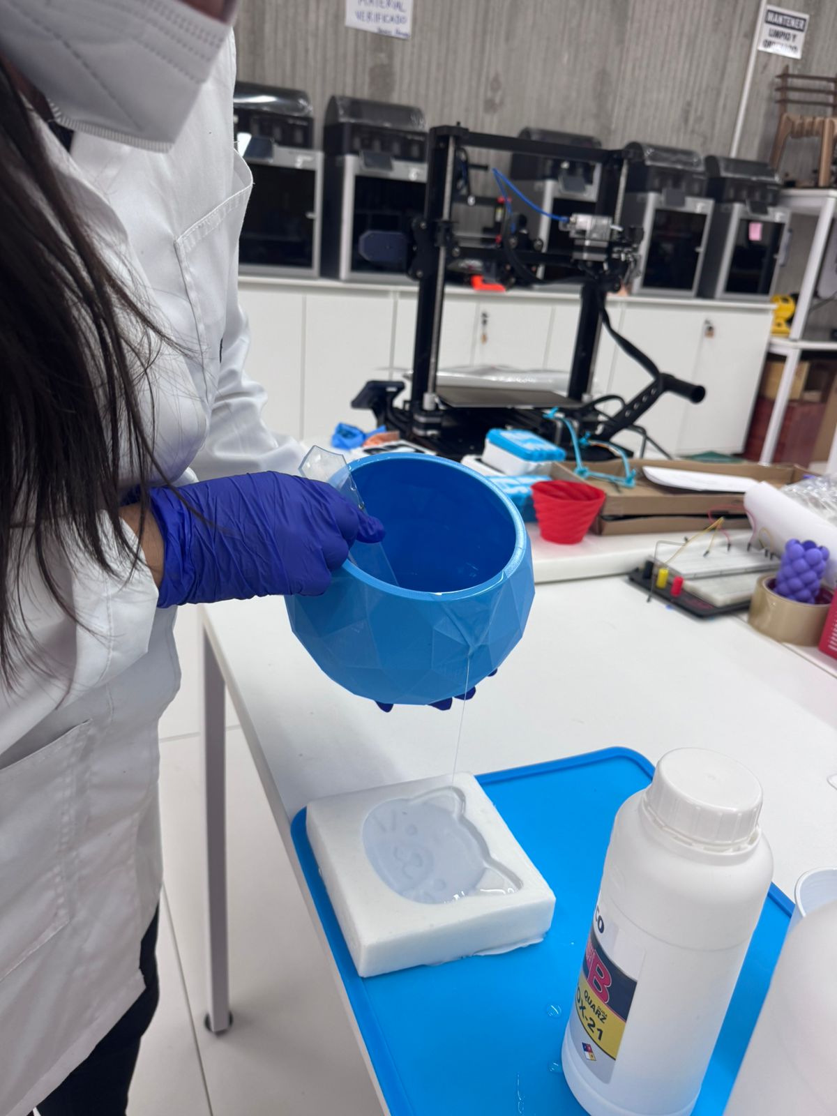 Pouring resin into silicone mold