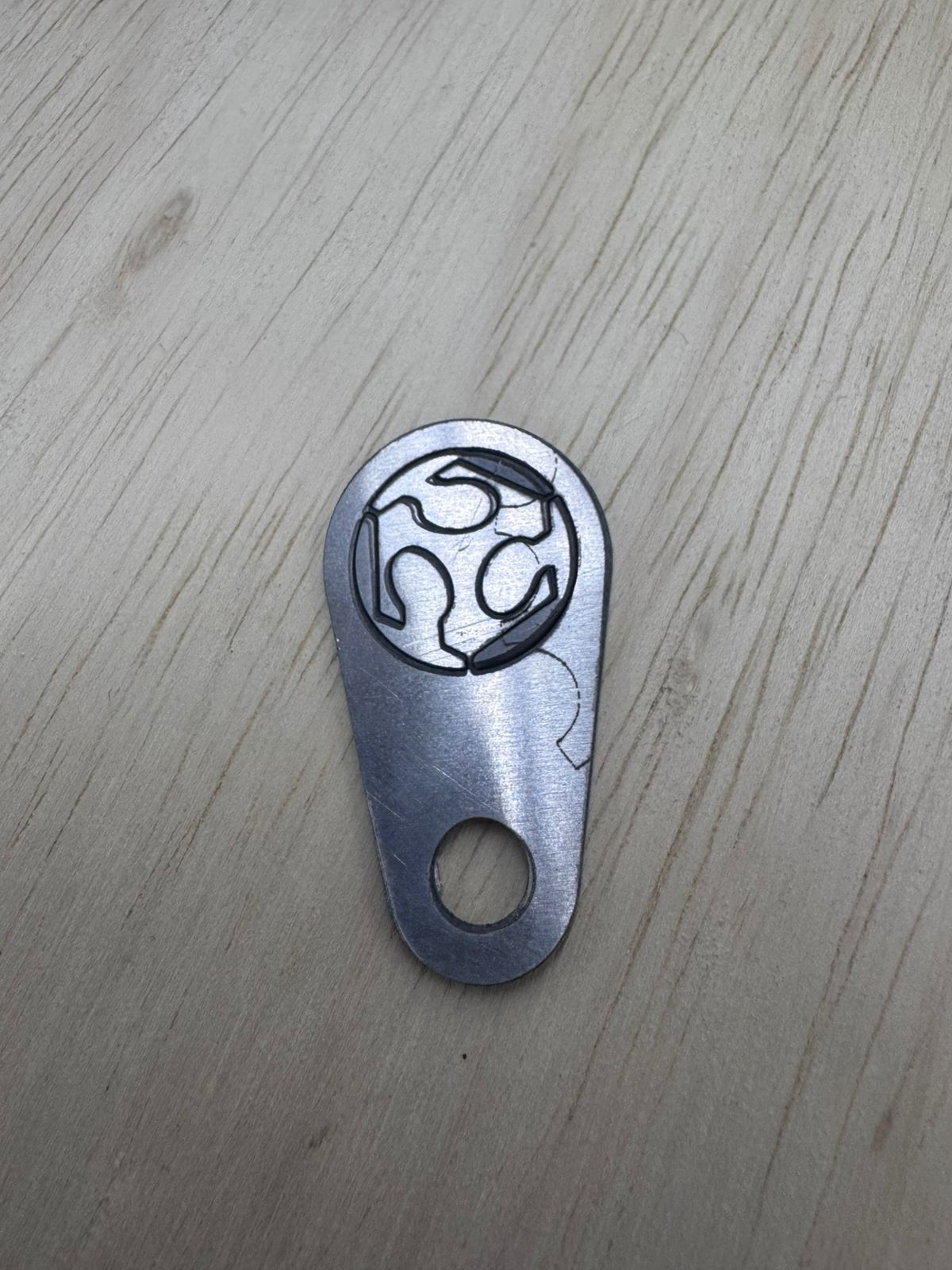 Final metal tag after fiber laser cutting