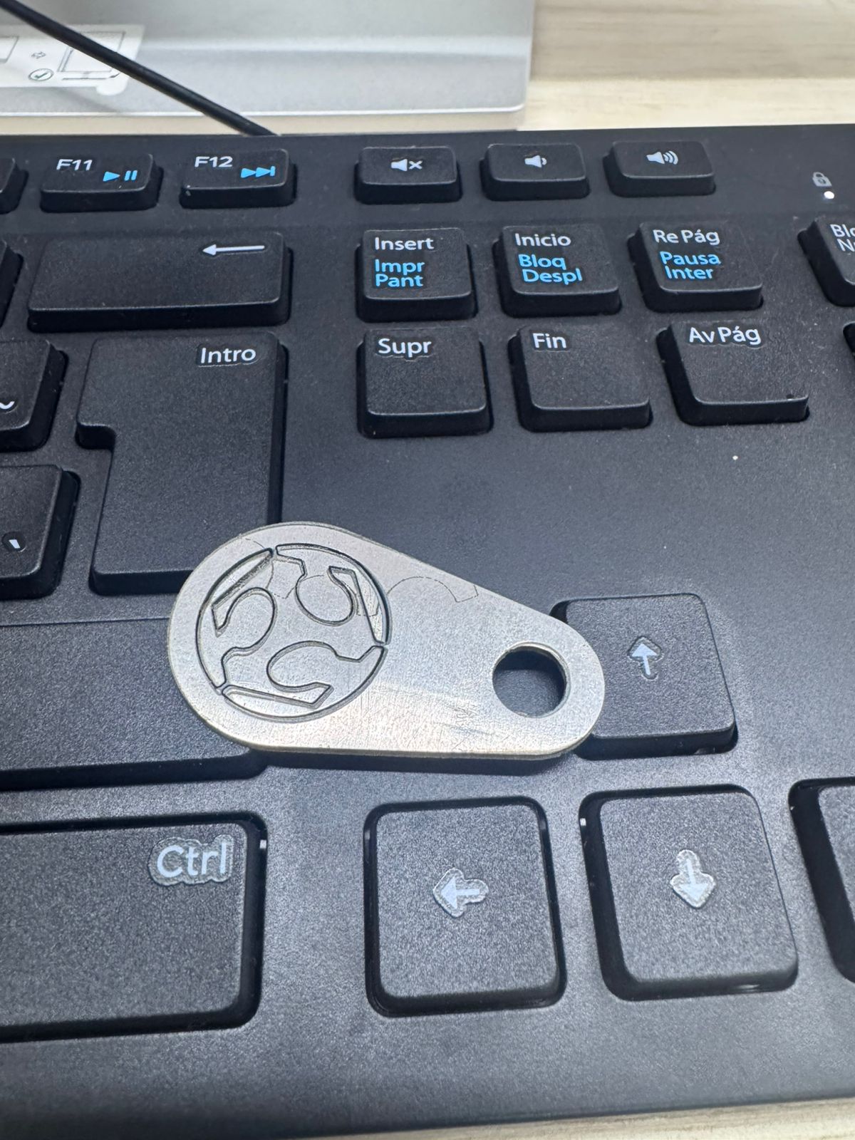 Metal tag detail on keyboard
