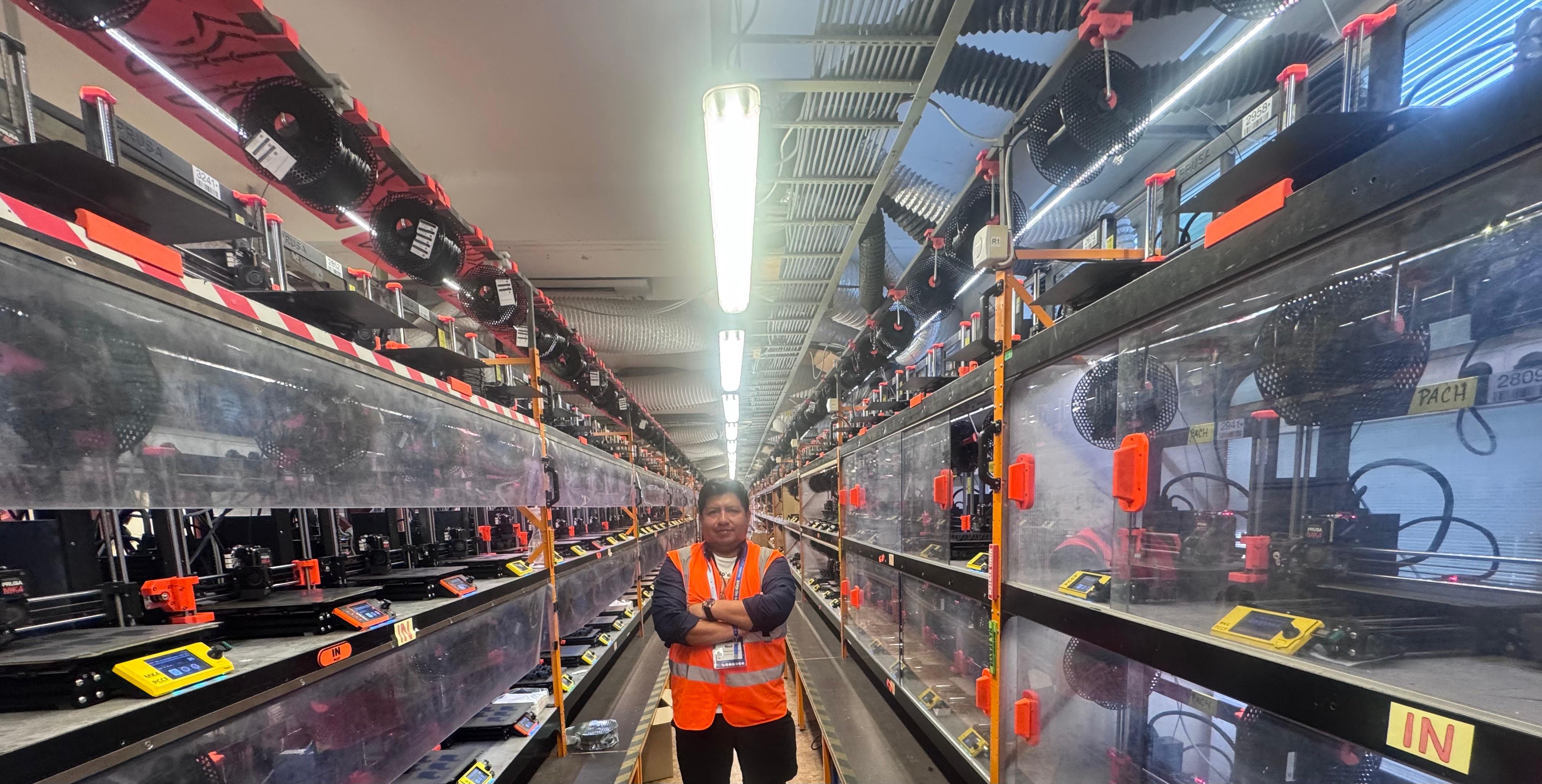 Rodrigo Guaman visiting a Prusa 3D printer production environment